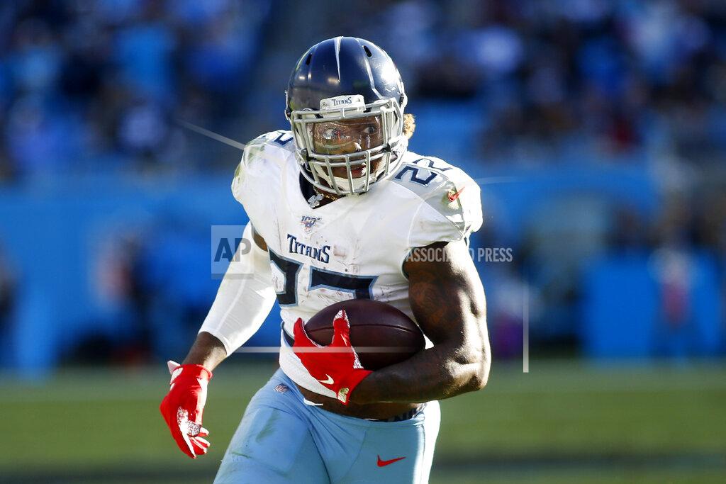 Brian Blanco Tennessee Titans running back Derrick Henry (22) runs against the Carolina Panthers during the second half of an NFL football game in Charlotte, N.C., Sunday, Nov. 3, 2019. (AP Photo/Brian Blanco)