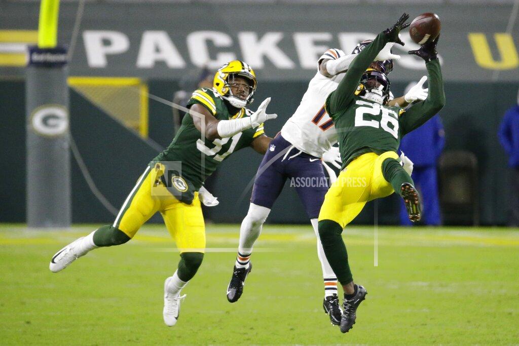 Mike Roemer Green Bay Packers' Darnell Savage intercepts a pass in front of Chicago Bears' Anthony Miller during the second half of an NFL football game Sunday, Nov. 29, 2020, in Green Bay, Wis. (AP Photo/Mike Roemer)