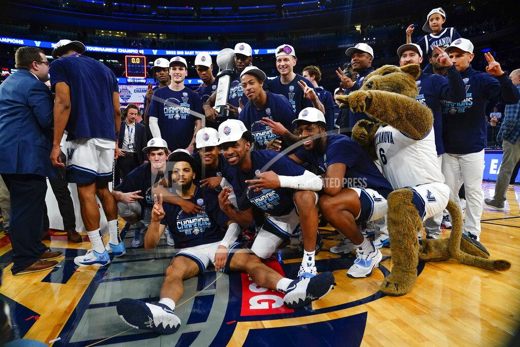 Frank Franklin Ii Villanova players pose with the tournament trophy after defeating Creighton in the final of the Big East conference tournament Saturday, March 12, 2022, in New York. (AP Photo/Frank Franklin II)