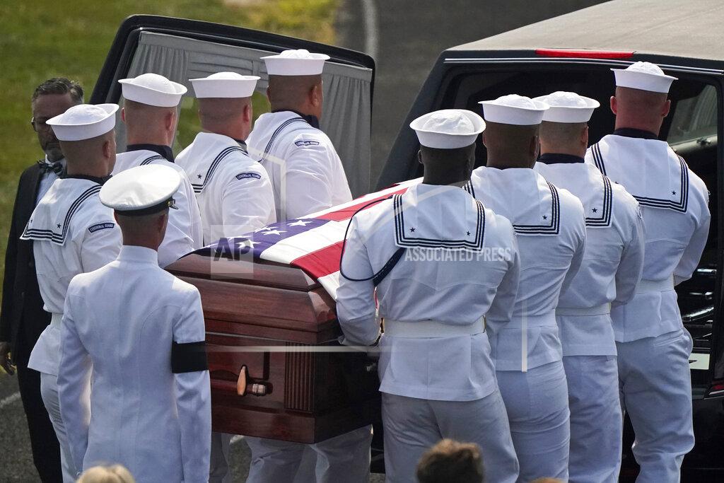 Tony Dejak The body of Navy Corpsman Maxton Soviak is put into the hearse at Edison High School Stadium, Monday, Sept. 13, 2021, in Milan, Ohio. Soviak was one of 13 U.S. troops killed in a suicide bombing at Afghanistan's Kabul airport on Aug. 26. (AP Photo/Tony Dejak)