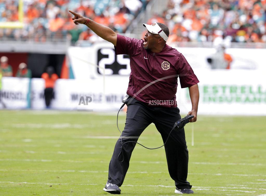 FILE - In this Sept. 2, 2017, file photo, Bethune-Cookman head coach Terry Sims shouts during the first half of an NCAA college football game against Miami in Miami Gardens, Fla. Nebraska will play a Bethune-Cookman team Saturday that’s lost its last five games against Football Bowl Subdivision opponents by an average of 32 points and has come no closer than three touchdowns in any of them. (AP Photo/Lynne Sladky, File)