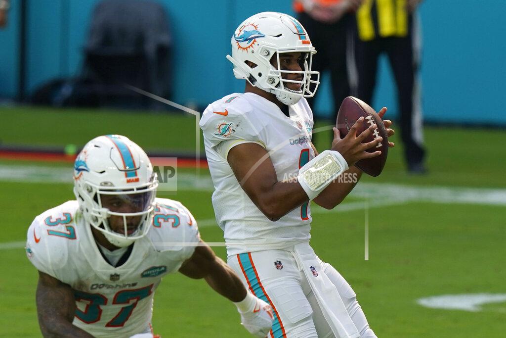 Lynne Sladky Miami Dolphins steps back before throwing his first touchdown pass, during the first half of an NFL football game against the Los Angeles Rams, Sunday, Nov. 1, 2020, in Miami Gardens, Fla. (AP Photo/Lynne Sladky)