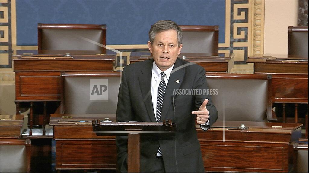 Uncredited FILE - In this Tuesday, March 24, 2020 file image from video, Sen. Steve Daines, R-Mont., speaks on the Senate floor at the U.S. Capitol in Washington. Daines faces a challenge from Montana Gov. Steve Bullock in the Nov. 3 election. (Senate Television via AP,File)