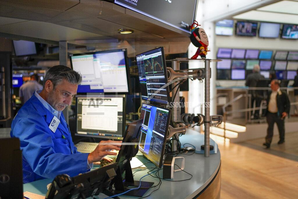 Seth Wenig Traders work on the floor at the New York Stock Exchange in New York, Friday, July 1, 2022. Stocks are off to a weak start on Friday, continuing a dismal streak that pushed Wall Street into a bear market last month as traders worry that inflation will be tough to beat and that a recession could be on the way as well. (AP Photo/Seth Wenig)