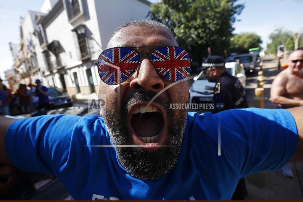 Angel Fernandez A Glasgow Ranger supporter cheers in downtown Seville, Spain, Tuesday, May 17, 2022. Eintracht Frankfurt will play Glasgow Rangers in the Europa League final Wednesday evening in Seville. (AP Photo/Angel Fernandez)