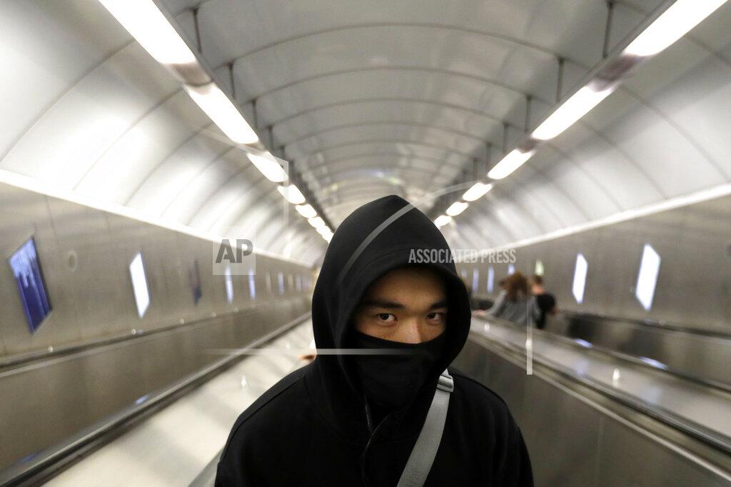 Petr David Josek A man wearing a face mask rides an escalator in subway in Prague, Czech Republic, Thursday, Sept. 17, 2020. The Czech Republic has been been facing the second wave of infections. The number of new confirmed coronavirus infections has been setting new records almost on a daily basis, currently surpassing 2,000 cases in one day for the first time. (AP Photo/Petr David Josek)