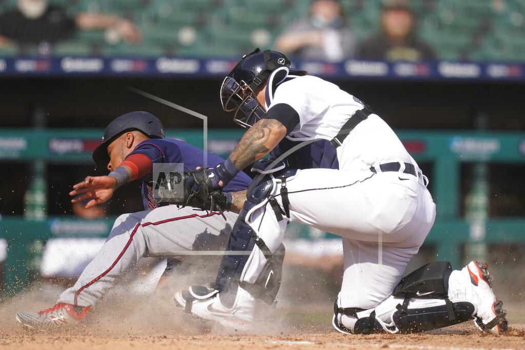 Carlos Osorio Minnesota Twins' Jorge Polanco is tagged out by Detroit Tigers catcher Grayson Greiner during the tenth inning of a baseball game, Tuesday, April 6, 2021, in Detroit. (AP Photo/Carlos Osorio)