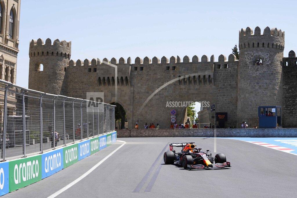 Darko Vojinovic Red Bull driver Max Verstappen of the Netherlands steers his car during the first free practice at the Baku Formula One city circuit, in Baku, Azerbaijan, Friday, June 4, 2021. The Formula one race will be held on Sunday. (AP Photo/Darko Vojinovic)