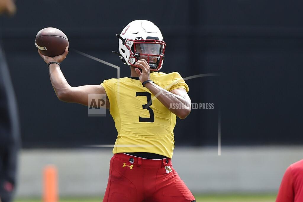 Gail Burton Maryland football quarterback Taulia Tagovailoa throws during a NCAA college football practice Friday, Aug.6, 2021, in College Park, Md.(AP Photo/Gail Burton)