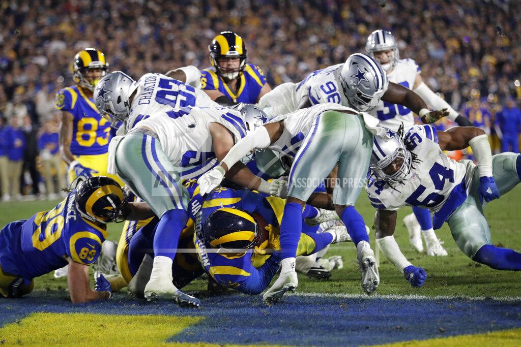 Marcio Jose Sanchez Los Angeles Rams running back C.J. Anderson scores against the Dallas Cowboys during the second half in an NFL divisional football playoff game Saturday, Jan. 12, 2019, in Los Angeles. (AP Photo/Marcio Jose Sanchez)