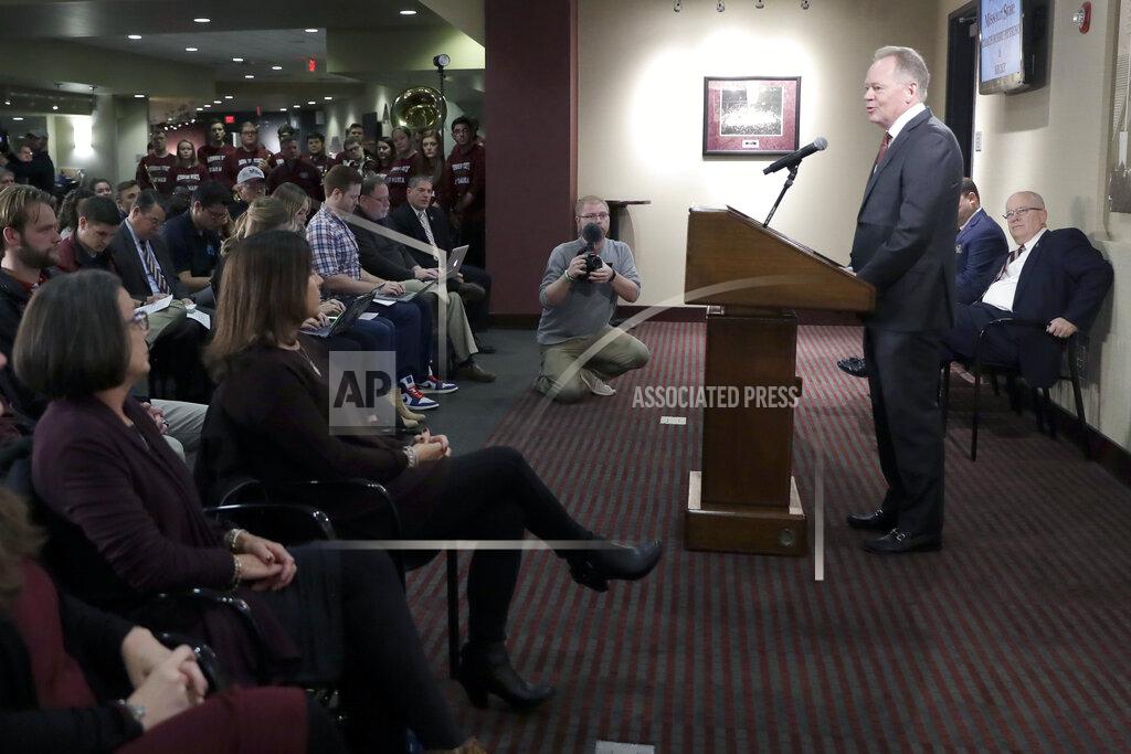 Jeff Roberson Bobby Petrino speaks after being introduced as the new NCAA college football head coach at Missouri State as his wife Becky, seated second from left, listens during a news conference Thursday, Jan. 16, 2020, in Springfield, Mo. Petrino has a 119-56 record in 14 seasons at Arkansas, Western Kentucky and Louisville and replaces Dave Steckel who was fired after winning just 13 games in five seasons. (AP Photo/Jeff Roberson)
