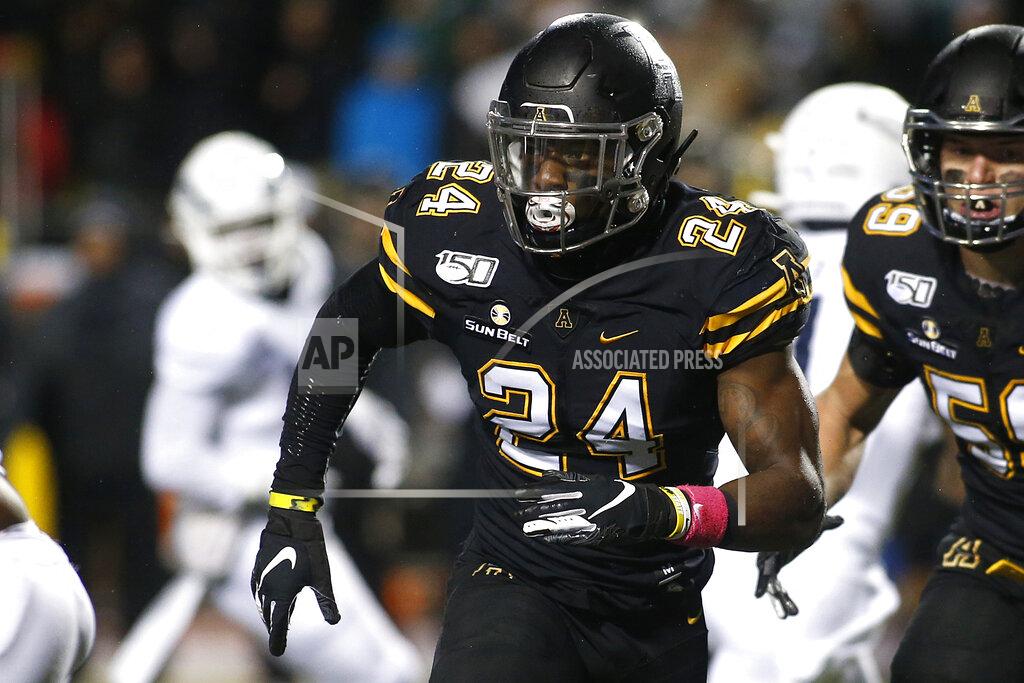 Brian Blanco Appalachian State linebacker Akeem Davis-Gaither (24) tracks the offense during the first half of the team's NCAA college football game against Georgia Southern on Thursday, Oct. 31, 2019, in Boone, N.C. (AP Photo/Brian Blanco)