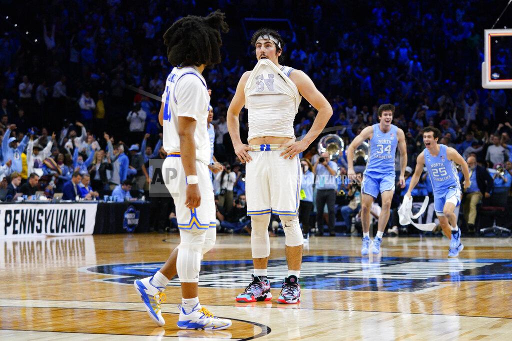 Chris Szagola UCLA's Tyger Campbell, left, and Jaime Jaquez Jr. react after UCLA lost a college basketball game against North Carolina in the Sweet 16 round of the NCAA tournament, Friday, March 25, 2022, in Philadelphia. (AP Photo/Chris Szagola)