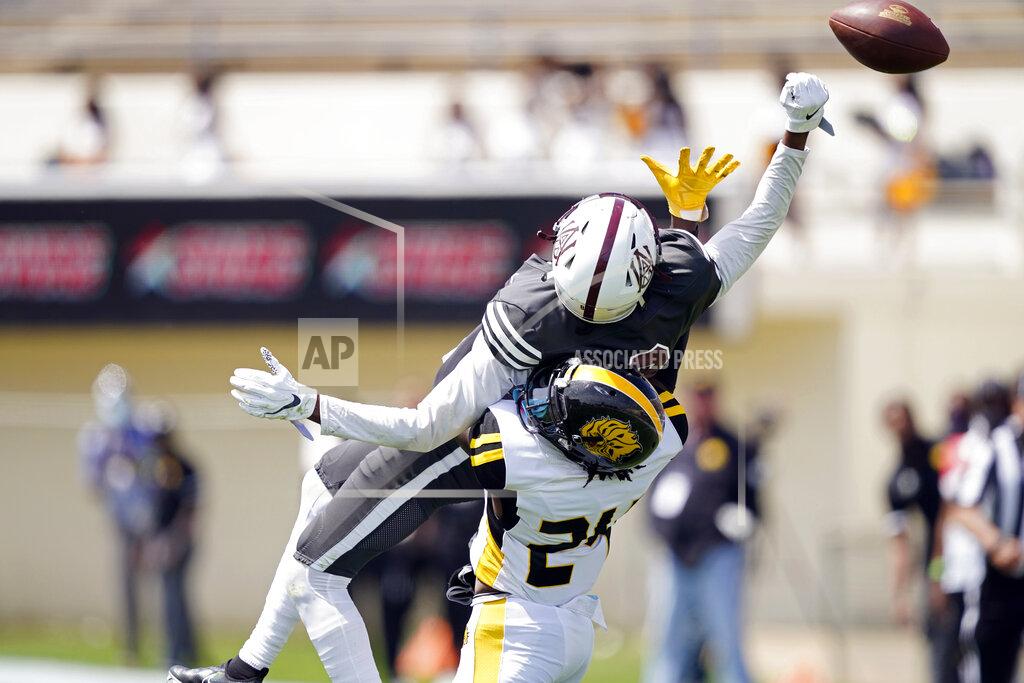 Rogelio V. Solis Arkansas-Pine defensive back Keyvien Johnson (24) breaks up a pass to Alabama A&M wide receiver Zabrian Moore (8) during the first half of the Southwestern Athletic Conference NCAA college football game, Saturday, May 1, 2021, in Jackson, Miss. (AP Photo/Rogelio V. Solis)