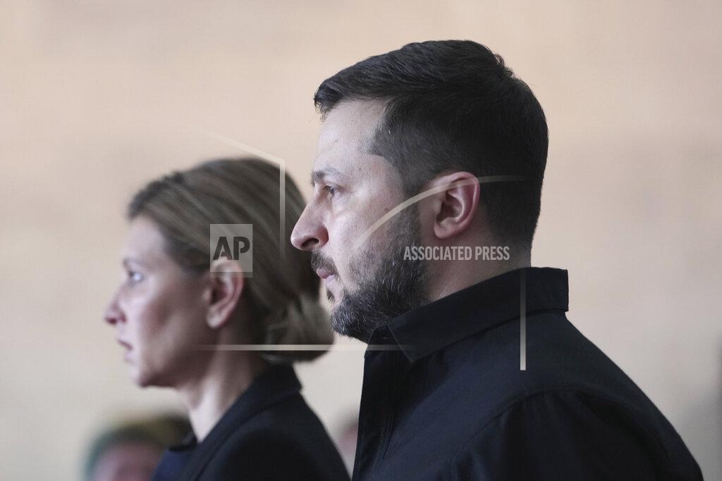 Evgeniy Maloletka President of Ukraine Volodymyr Zelenskyy and his wife Olena Zelenska attend the funeral of Leonid Kravchuk, independent Ukraine's first president, at the International Convention Center Ukrainian House, in Kyiv, Ukraine, Tuesday, May 17, 2022. Kravchuk led Ukraine to independence amid the collapse of the Soviet Union and served as its first president. He died on May 10 at the age of 88. (AP Photo/Evgeniy Maloletka)