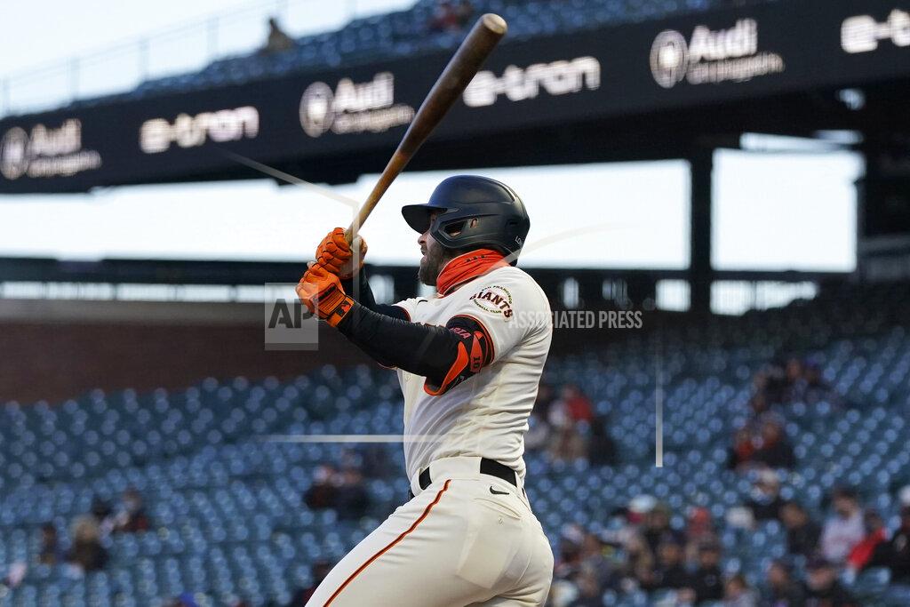 Jeff Chiu San Francisco Giants' Evan Longoria hits a two-run double against the Colorado Rockies during the second inning of a baseball game in San Francisco, Monday, April 26, 2021. (AP Photo/Jeff Chiu)