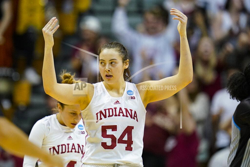 Michael Conroy Indiana forward Mackenzie Holmes (54) celebrates in the second half of a college basketball game against Princeton in the second round of the NCAA tournament in Bloomington, Ind., Monday, March 21, 2022. Indiana defeated Princeton 56-55. (AP Photo/Michael Conroy)