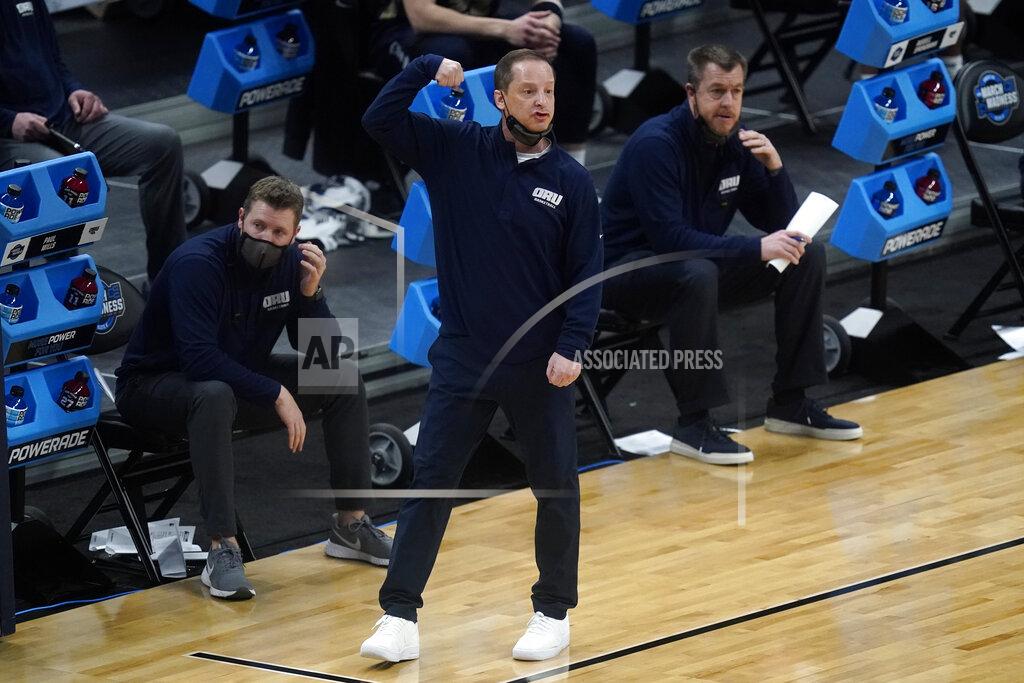 Darron Cummings Oral Roberts head coach Paul Mills watches from the bench during the first half of a Sweet 16 game against Arkansas in the NCAA men's college basketball tournament at Bankers Life Fieldhouse, Saturday, March 27, 2021, in Indianapolis. (AP Photo/Darron Cummings)