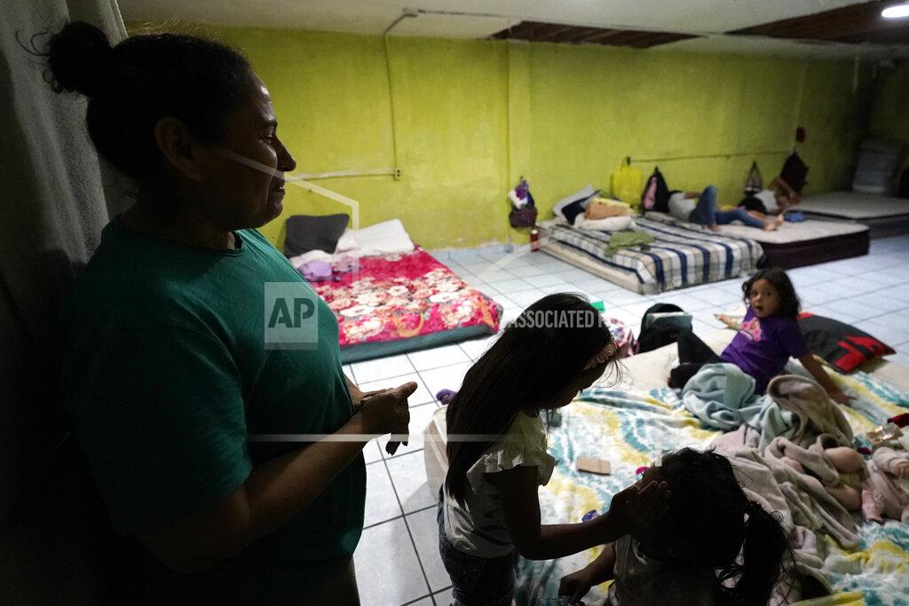Gregory Bull FILE - Iracema Figueroa, left, of Honduras, looks on as her children play with others at a shelter for migrants Friday, May 20, 2022, in Tijuana, Mexico. The Supreme Court has ruled that the Biden administration properly ended a Trump-era policy forcing some U.S. asylum-seekers to wait in Mexico. The justices’ 5-4 decision for the administration came in a case about the “Remain in Mexico” policy under President Donald Trump. (AP Photo/Gregory Bull, File)