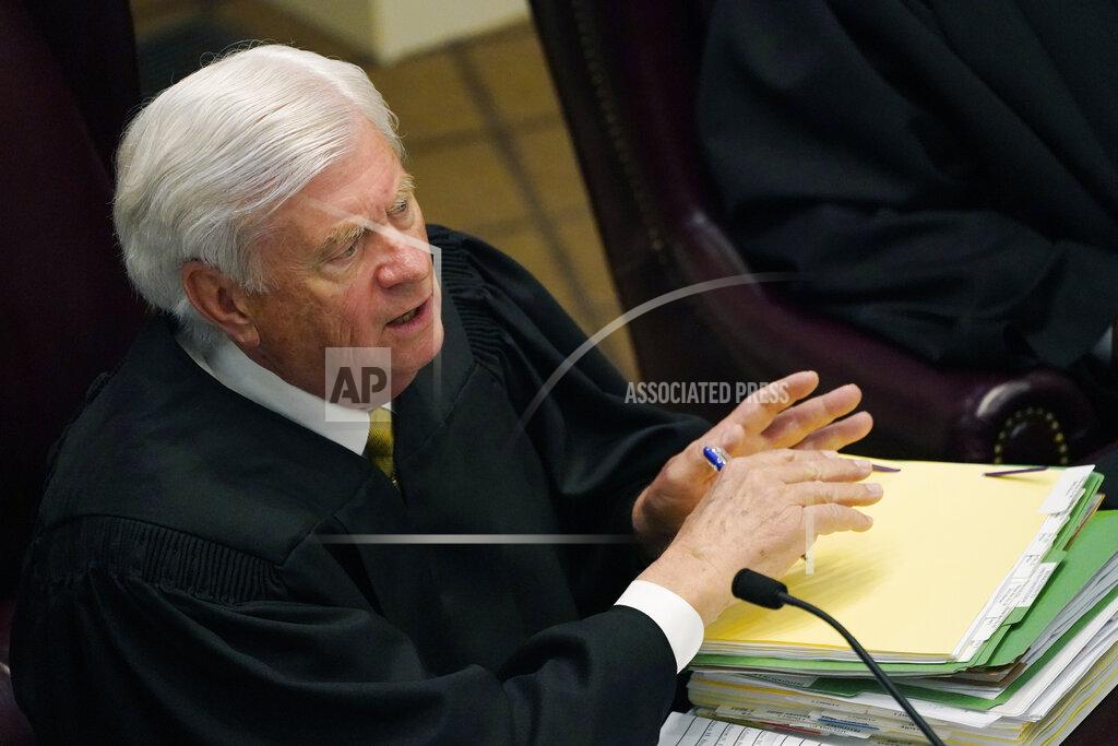 Rogelio V. Solis Mississippi Supreme Court Chief Justice Michael Randolph questions attorneys presenting arguments over a lawsuit that challenges the state's initiative process and seeks to overturn a medical marijuana initiative that voters approved in November 2020, Wednesday, April 14, 2021, in Jackson, Miss. (AP Photo/Rogelio V. Solis)