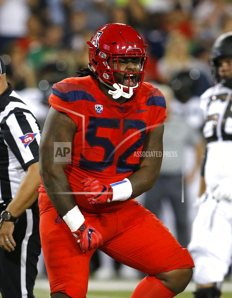Rick Scuteri Arizona defensive tackle PJ Johnson (52) reacts after making a tackle for a loss against Oregon in the first half during an NCAA college football game, Saturday, Oct. 27, 2018, in Tucson, Ariz. (AP Photo/Rick Scuteri)