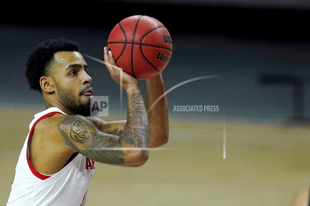 Julio Cortez Maryland guard Eric Ayala shoots a free throw to give his team the lead and the eventual victory with seconds left during the second half of an NCAA college basketball game against Purdue, Tuesday, Feb. 2, 2021, in College Park, Md. Maryland won 61-60. (AP Photo/Julio Cortez)