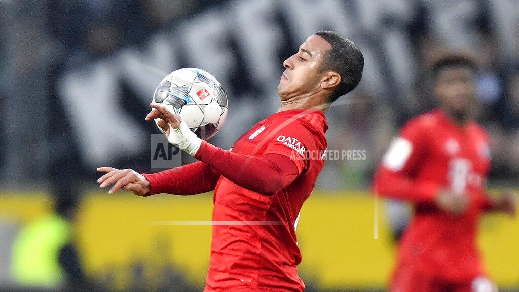 Martin Meissner File -- In this Saturday, Dec. 7, 2019 file photo Bayern's Thiago plays during the German Bundesliga soccer match between Borussia Moenchengladbach and Bayern Munich at the Borussia Park in Moenchengladbach, Germany. Thiago Alcantara is joining Liverpool after ending his seven-year stint at European champion Bayern Munich. (AP Photo/Martin Meissner, file)