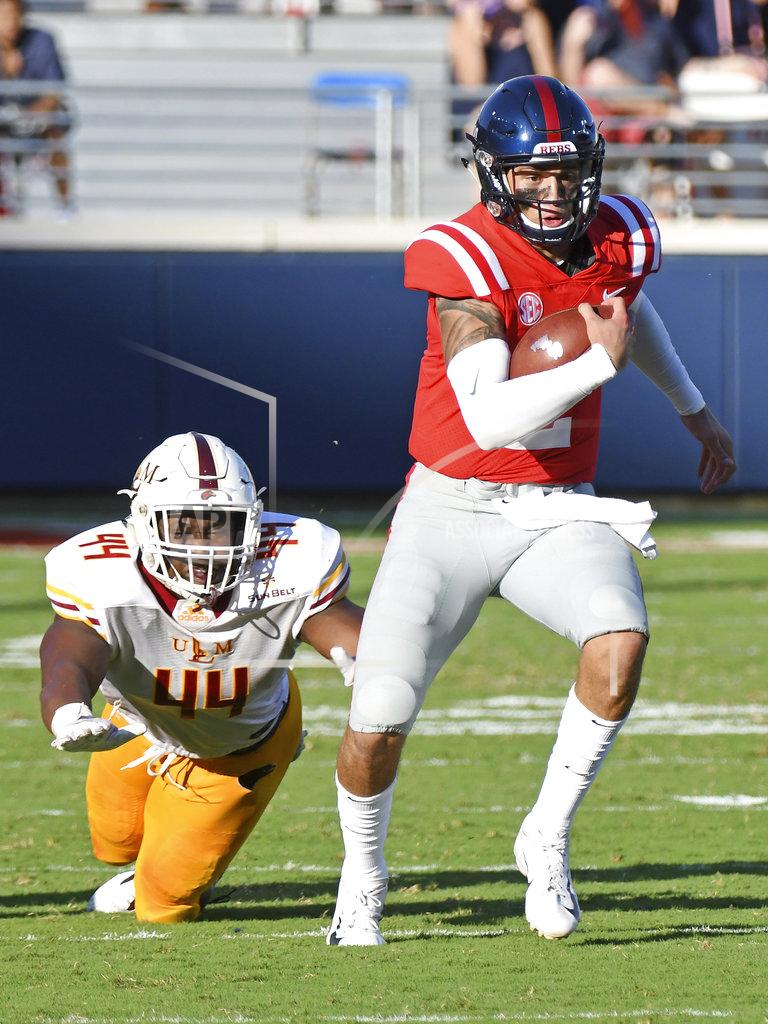 Thomas Graning Mississippi quarterback Matt Corral (2) runs the ball past Louisiana Monroe defensive end Ty Shelby (44) during the second half of an NCAA college football game in Oxford, Miss., Saturday, Oct. 6, 2018. Mississippi won 70-21. (AP Photo/Thomas Graning)