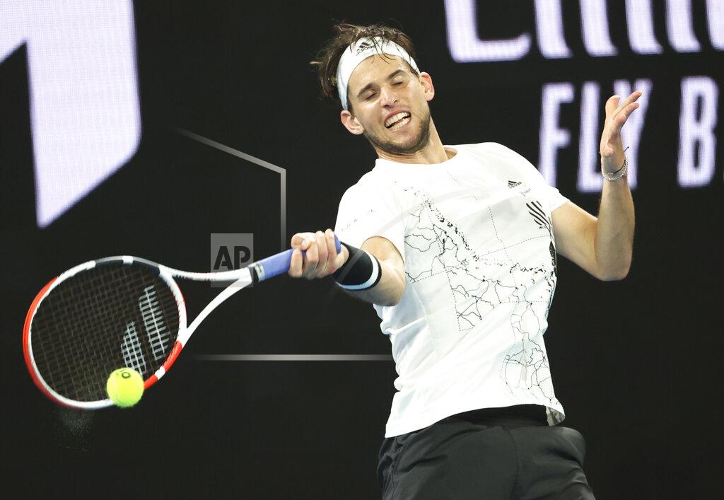 Hamish Blair Austria's Dominic Thiem plays a shot during his third round match against Australia's Nick Kyrgios at the Australian Open tennis championship in Melbourne, Australia, Friday, Feb. 12, 2021.(AP Photo/Hamish Blair)