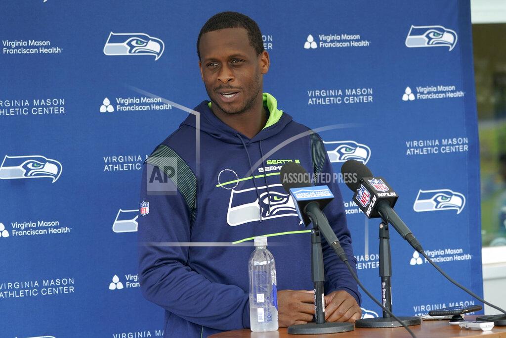 Ted S. Warren Seattle Seahawks quarterback Geno Smith talks to reporters after NFL football practice Monday, Aug. 1, 2022, in Renton, Wash. (AP Photo/Ted S. Warren)