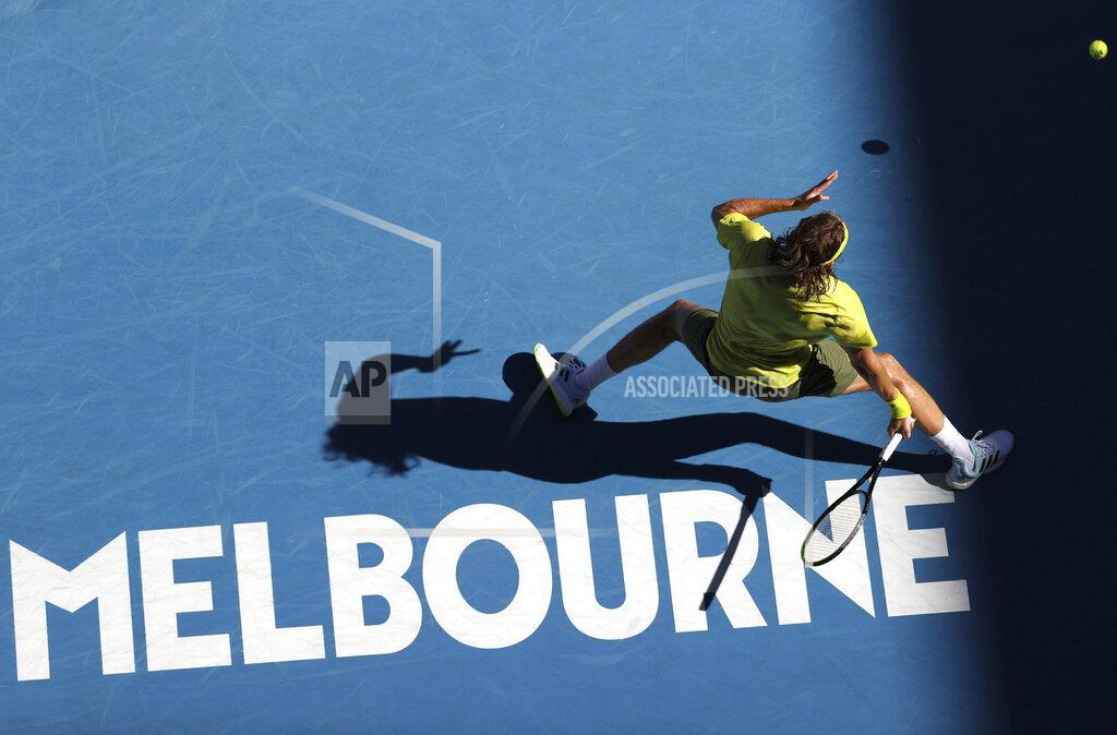 Hamish Blair Greece's Stefanos Tsitsipas hits a forehand to Sweden's Mikael Ymer during their third round match at the Australian Open tennis championships in Melbourne, Australia, Saturday, Feb. 13, 2021. (AP Photo/Hamish Blair)