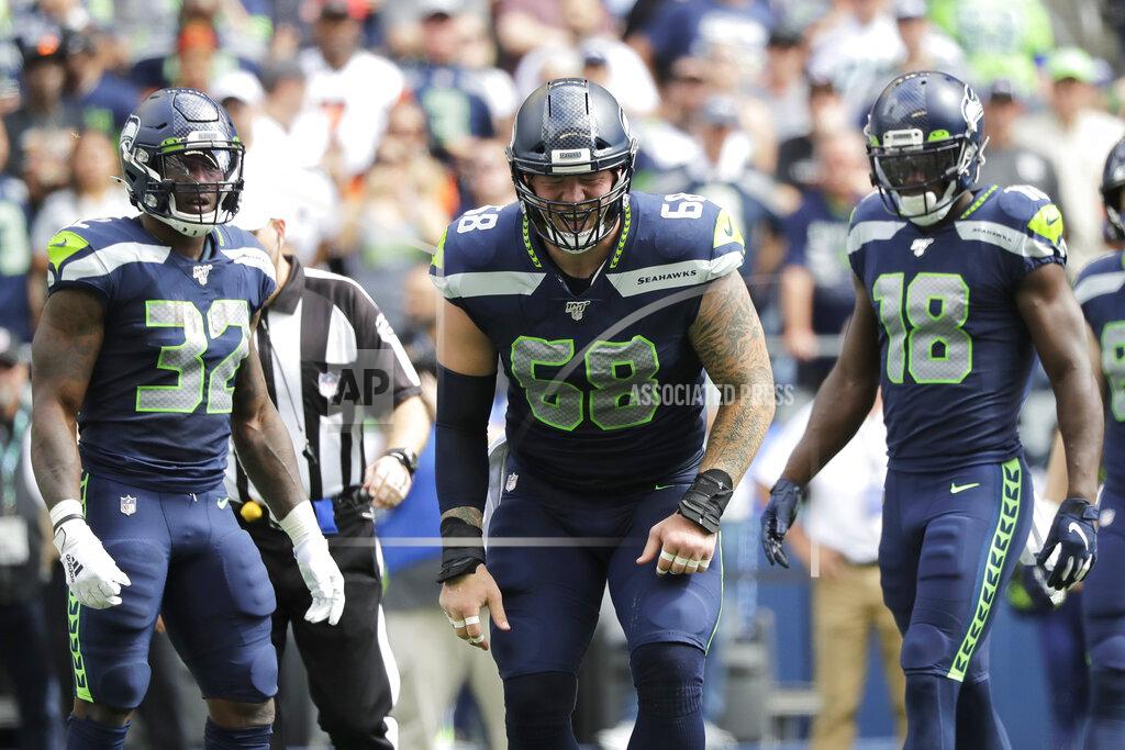 John Froschauer Seattle Seahawks center Justin Britt (68) reacts after going down with an injury during the first half of an NFL football game against the Cincinnati Bengals, Sunday, Sept. 8, 2019, in Seattle. (AP Photo/John Froschauer)
