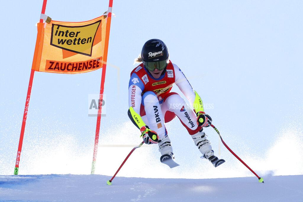 Marco Trovati Switzerland's Lara Gut Behrami speeds down the course during an alpine ski, women's World Cup downhill training, in Zauchensee, Austria, Friday, Jan.14, 2022. (AP Photo/Marco Trovati)