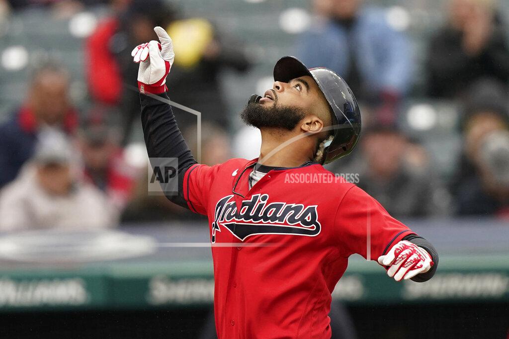 Tony Dejak Cleveland Indians' Bobby Bradley celebrates after hitting a solo home run in the fourth inning in the first baseball game of a doubleheader against the Chicago White Sox, Thursday, Sept. 23, 2021, in Cleveland. (AP Photo/Tony Dejak)