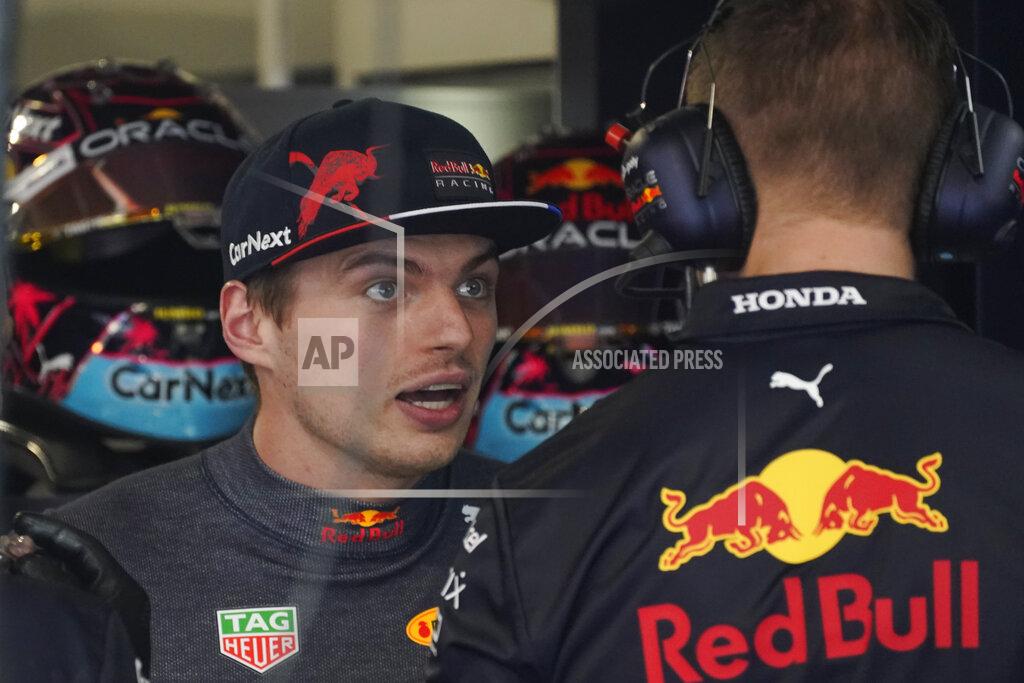 Darron Cummings Red Bull driver Max Verstappen of the Netherlands speaks to a crew member ahead of the first practice session for the Formula One Miami Grand Prix auto race at the Miami International Autodrome, Friday, May 6, 2022, in Miami Gardens, Fla. (AP Photo/Darron Cummings)