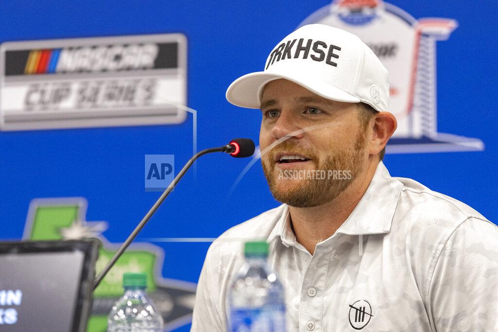 Stephen Spillman Trackhouse owner Justin Marks speaks during a post-race interview after winning a NASCAR Cup Series auto race at Circuit of the Americas, Sunday, March 27, 2022, in Austin, Texas. (AP Photo/Stephen Spillman)