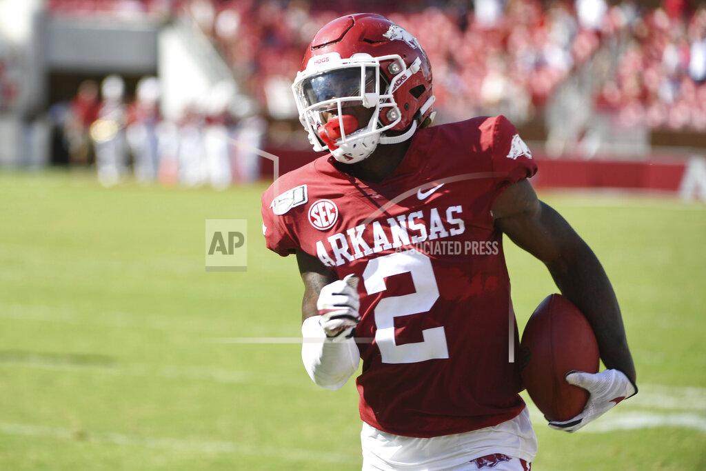 Michael Woods Arkansas defensive back Kamren Curl returns an interception against Portland State in the first half of an NCAA college football game, Saturday, Aug. 31, 2019 in Fayetteville, Ark. (AP Photo/Michael Woods)