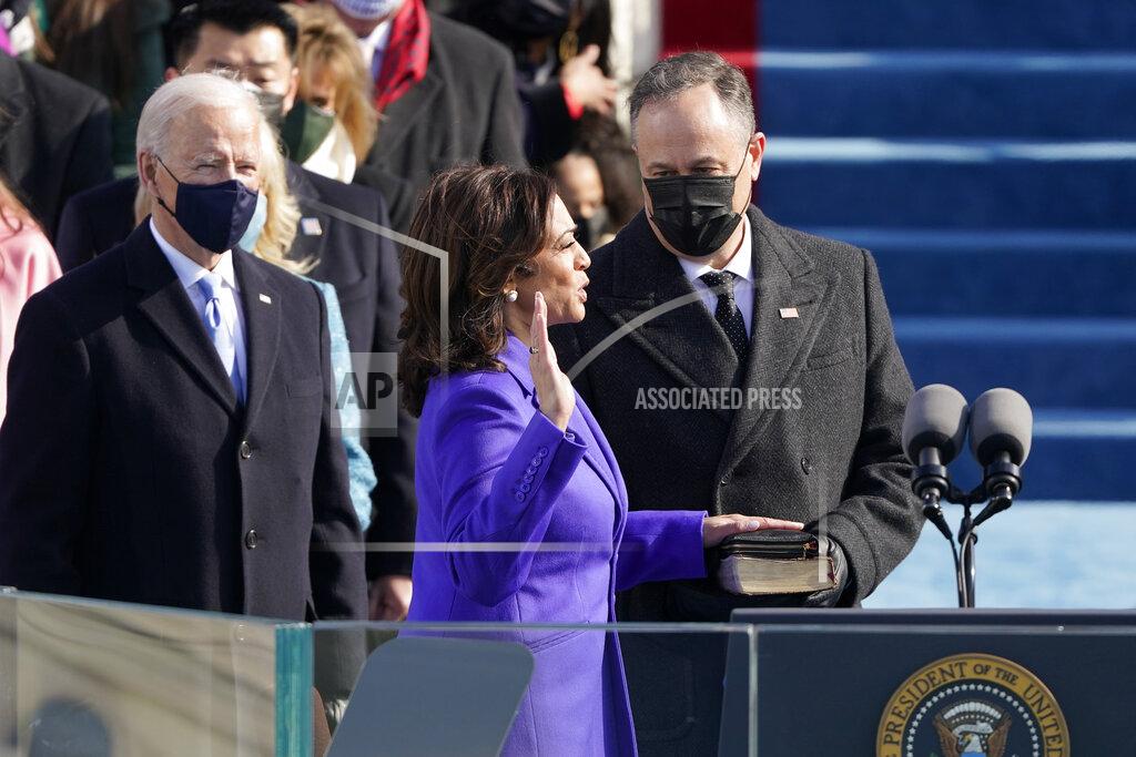 Patrick Semansky Kamala Harris is sworn in as vice president by Supreme Court Justice Sonia Sotomayor as her husband Doug Emhoff holds the Bible during the 59th Presidential Inauguration at the U.S. Capitol in Washington, Wednesday, Jan. 20, 2021. (AP Photo/Patrick Semansky, Pool)