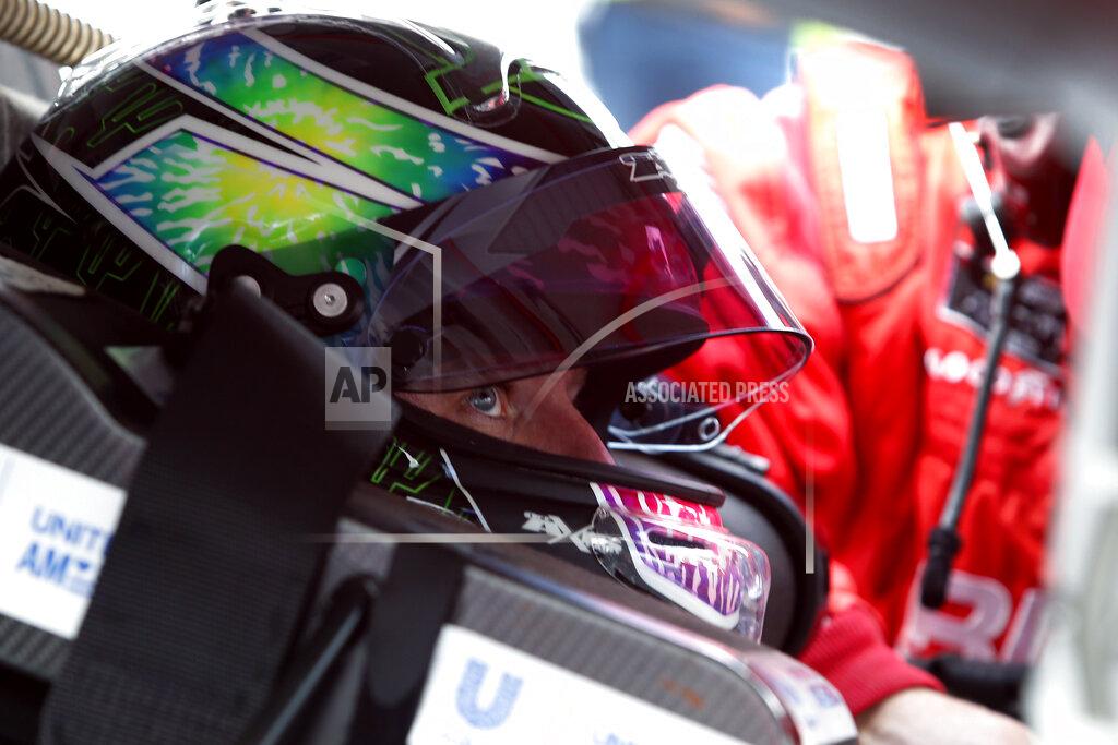 Ralph Freso Justin Allgaier gets strapped into his race car prior to an NASCAR Xfinity Series auto race at Phoenix Raceway, Saturday, Nov. 7, 2020, in Avondale, Ariz. (AP Photo/Ralph Freso)