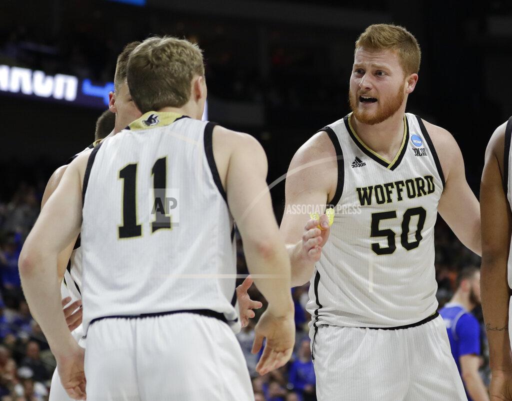 John Raoux Wofford's Matthew Pegram (50) talks with teammates during the first half against Seton Hall in a first-round game in the NCAA men’s college basketball tournament in Jacksonville, Fla., Thursday, March 21, 2019. (AP Photo/John Raoux)