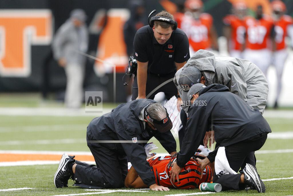 Gary Landers Cincinnati Bengals wide receiver Alex Erickson (12) lies on the field with an apparent injury in the first half of an NFL football game against the Arizona Cardinals, Sunday, Oct. 6, 2019, in Cincinnati. (AP Photo/Gary Landers)