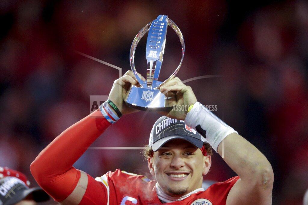 Charlie Riedel Kansas City Chiefs' Patrick Mahomes celebrates with the Kansas City Chiefs after the NFL AFC Championship football game against the Tennessee Titans Sunday, Jan. 19, 2020, in Kansas City, MO. The Chiefs won 35-24 to advance to Super Bowl 54. (AP Photo/Charlie Riedel)