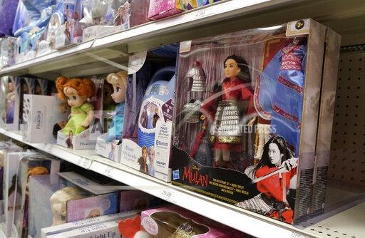 FILE - A doll based on the upcoming Walt Disney Studios film "Mulan" is displayed in the toy section of a Target department store, April 30, 2020, in Glendale, Calif. As supply chain bottlenecks create shortages on many items, some charities are struggling to secure holiday gift wishes from kids in need. They're reporting they can't find enough items in stock, or are facing shipping delays both in receiving and distributing the gifts. The founder of the organization One Simple Wish says many gift requests for gaming consoles and electronic items submitted to the charity have been out of stock. (AP Photo/Chris Pizzello, file)