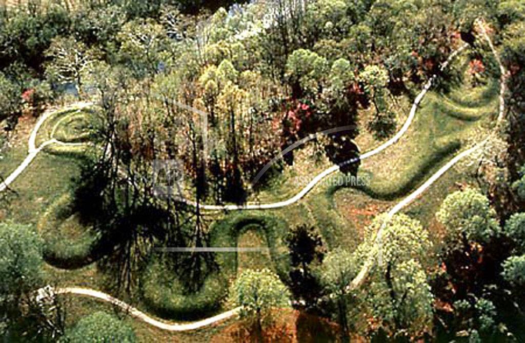 Uncredited FILE - This undated image shows a view of Serpent Mound in Pleasant Hill, Ohio. The location is featured in a collection of mini-essays by American writers published online by the Frommer's guidebook company about places they believe helped shape and define America. (The Cincinnati Enquirer via AP, File)