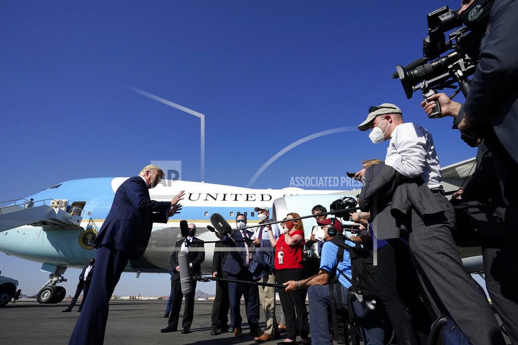 Alex Brandon President Donald Trump speaks to reporters at Phoenix Sky Harbor International Airport, Monday, Oct. 19, 2020, in Phoenix. (AP Photo/Alex Brandon)