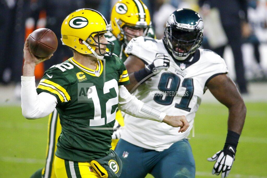 Mike Roemer Green Bay Packers' Aaron Rodgers throws during the second half of an NFL football game against the Philadelphia Eagles Sunday, Dec. 6, 2020, in Green Bay, Wis. (AP Photo/Mike Roemer)