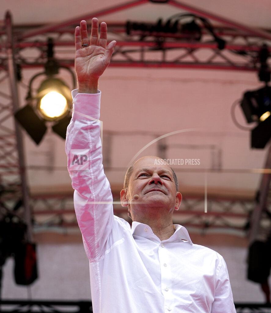 Martin Meissner Olaf Scholz, German Finance Minister and top candidate for Chancellor, speaks at the final election campaign event of the Social Democratic Party, SPD, in Cologne, Germany, Friday, Sept. 24, 2021. The German elections will take place next Sunday, Sept. 26. (AP Photo/Martin Meissner, POOL)