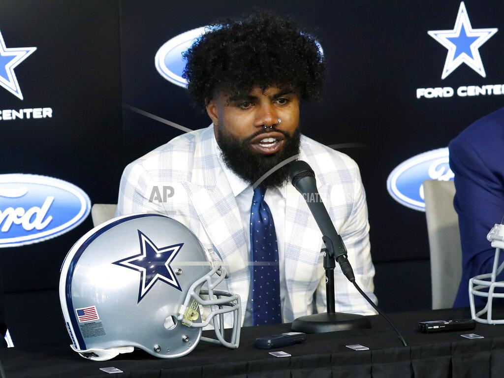 Tony Gutierrez Dallas Cowboys running back Ezekiel Elliott speaks about his new contract during a news conference at the team's NFL football team's practice facility in Frisco, Texas, Thursday, Sept. 5, 2019. Elliott's agreement on a new contract ended a holdout that covered all of training camp and the preseason and came four days before the season opener at home against the New York Giants. (AP Photo/Tony Gutierrez)