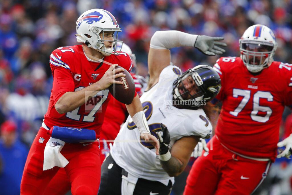 John Munson Buffalo Bills quarterback Josh Allen (17) rolls out looking to pass during the second half of an NFL football game against the Baltimore Ravens in Orchard Park, N.Y., Sunday, Dec. 8, 2019. (AP Photo/John Munson)