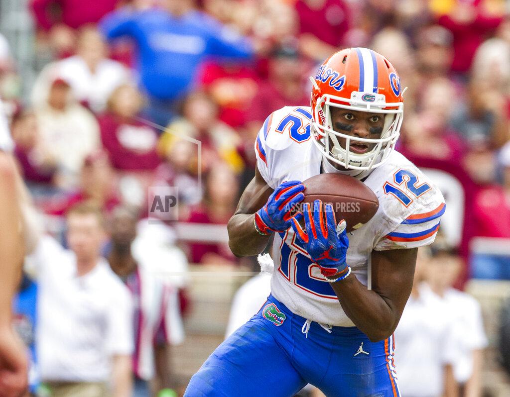 Mark Wallheiser Florida wide receiver Van Jefferson (12) makes a 38-yard touchdown catch in the second half of an NCAA college football game against Florida State in Tallahassee, Fla., Saturday, Nov. 24, 2018. Florida won 41-14. (AP Photo/Mark Wallheiser)